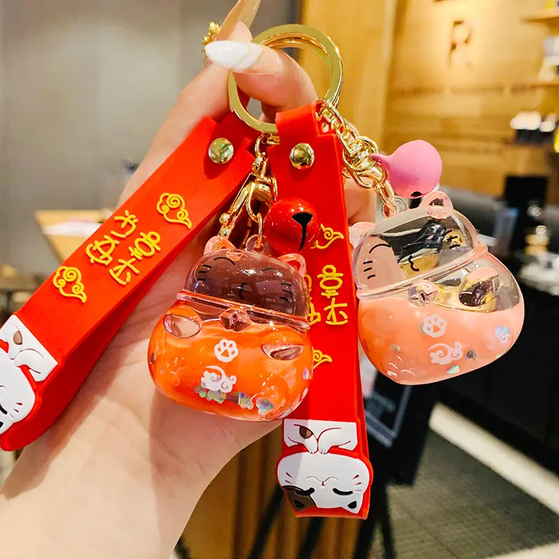 Mignon Maneki Neko chat chanceux 2023 cristal liquide sables mouvants bracelet en caoutchouc porte-clés porte-clés porte-clés pour femmes sac pendentif charmes