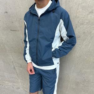 ชุดกีฬาผ้าไนลอนสำหรับผู้ชายชุดวอร์มเสื้อกันลมกางเกงขาสั้นผ้าไนลอนสำหรับผู้ชายเสื้อแจ็คเก็ตกันลมสีออกแบบโลโก้ได้ตามต้องการ - Product Image 4