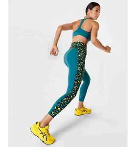 Pantalones deportivos de cintura alta brillantes personalizados para mujer, recién llegados, mallas de Yoga, bolsillos prácticos, ropa deportiva con estampado de patrón sólido - Product Image 5