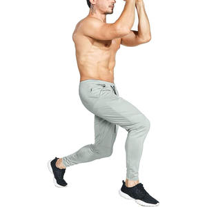 Pantalones deportivos de gimnasio con cremallera lateral y bolsillos, corte ajustado para hombre, subidos por Dress Sports - Product Image 5