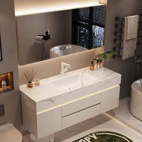 Meuble-lavabo mural de salle de bain style nordique avec vasque en pierre frittée courbée à chaud, miroir intelligent et rangement
