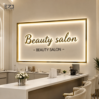 Enseigne murale lumineuse LED 3D personnalisée en métal doré rétroéclairé EZD pour la publicité des salons de beauté, spas, studios et devantures de magasins