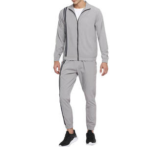 Ropa deportiva todo el día Chándal deportivo para hombre con diseño de cuello con cremallera y pantalones flexibles hechos para clases de ejercicio y fitness - Product Image 1