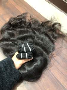 Top Offre Spéciale Naturel Ondulé Naturel Noir Pour Les Femmes Sur Les Prix De Gros Simple Dessiné Extension De Cheveux 100% Cuticule Aligné Cheveux Bruts - Product Image 4