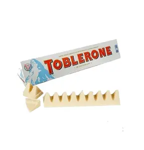 Toblerone Milk Chocolate Bar, 100 g-smooth susu Swiss chocolate dengan delectable honey dan almond nougat