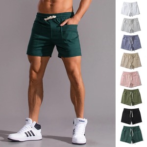 Nuevo estilo de verano para hombres Waffger moda casual deportes al aire libre estilo de playa pantalones cortos con cordón de color sólido - Product Image 1