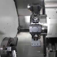 Tour à métaux CNC à double broche au prix le plus bas, avec tourelle motorisée, outillage en direct, lit de tour en fonte
