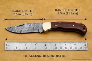 Couteau utilitaire pliant artisanal en acier Damas OEM avec manche en bois naturel, embouts en acier et design compact pour la poche - Product Image 6