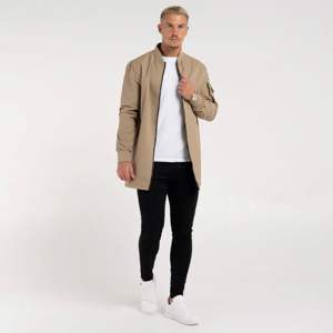 Man Jackets <b>Sand</b> Longline Bomber Jacket Regular Fit with Baseball Collar, Multiple Pockets and Sleek Modern Appeal - Product Image 1