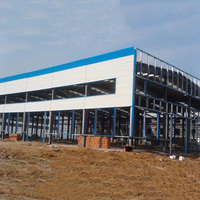 Bâtiment en métal préfabriqué structure en acier entrepôt atelier garage en utilisant l'isolation EPS panneau sandwich mur et toit.