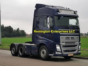 Camion tracteur Volvo FH 500 6x2 2015 avec cabine à toit haut, calandre chromée bleu foncé et phares LED - Product Image 2