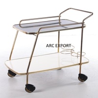 Dernier chariot de service standard moderne en métal antique en acier argenté avec décoration unique de luxe à 2 niveaux pour servir des aliments Brekfast