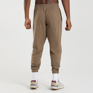 กางเกงจ็อกเกอร์ผ้าฟลีซพิมพ์ลายผู้ชายสุดฮิต ผ้าฝ้าย 100% รับผลิตแบบ OEM สีพื้น ปรับแต่งได้ ทรงเข้ารูปที่ข้อเท้า มีกระเป๋าข้างสองข้าง สำหรับออกกำลังกาย - Product Image 2