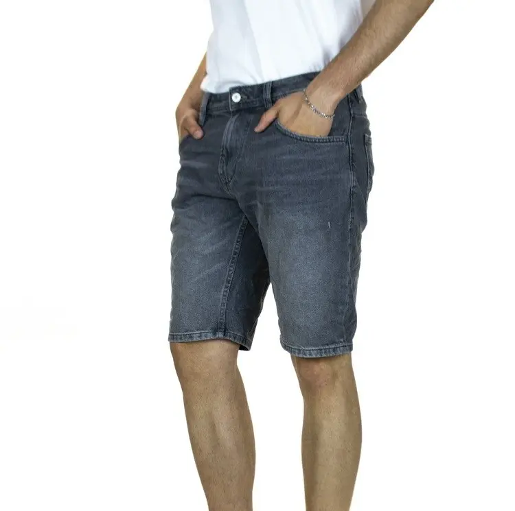 Transpirable 2023 nuevo estilo al por mayor verano Denim rasgado Casual Cut Up Jeans medio pantalones cortos para hombres