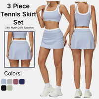 Ensemble de tennis trois pièces pour femme, avec débardeur court côtelé effet deux pièces et jupe trapèze, pour le sport, le golf et l'entraînement