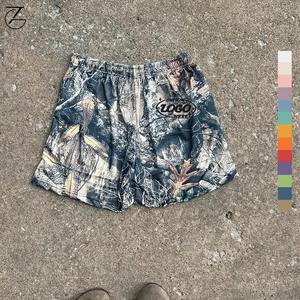 Short de basket-ball camouflage avec logo personnalisé Short de basket-ball à séchage rapide, respirant et anti-rides, avec maille à sublimation - Product Image 4