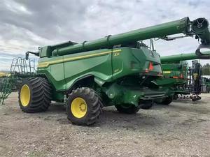 Moissonneuse-batteuse John Deere X9 1100 d'occasion puissante pour la récolte du blé, du maïs, des pommes de terre, du riz et des olives avec moteur - Product Image 6