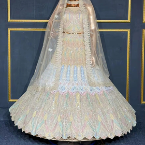 ชุดเลเฮนกาโชลีงานหนักสำหรับงานแต่งปีใหม่ พร้อมงานปักจาร์กันอย่างเต็มรูปแบบ และสไตล์อินเดียแบบดั้งเดิมที่โดดเด่น - Product Image 1