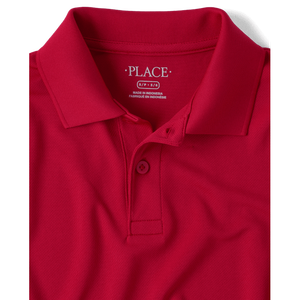 Polo de rendimiento rojo para niños para uniformes escolares - Product Image 1