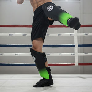 Espinilleras de Cuero para Entrenamiento de Muay Thai y Kickboxing, Protección Profesional de Alta Calidad, Espinillera con Protección de Empeine, Color y Logotipo Personalizables - Product Image 4