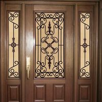 Porte en fer forgé sur mesure avec des motifs en spirale artistiques et une finition en poudre durable pour une longévité accrue