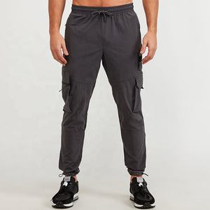 Pantalones cargo con diseño de logotipo personalizado Pantalones rectos para hombre con bolsillos Pantalones para correr de lana para hombre con estilo Pantalones de chándal de invierno cálidos - Product Image 2