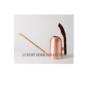 Bidon d'eau en acier inoxydable en métal minimaliste moderne avec une finition polie en or rose brillant et une esthétique de maison contemporaine - Product Image 1