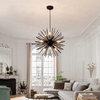 Lustre suspendu créatif irrégulier en fer design pour lit à manger salon lustre circulaire en acier inoxydable d'art en laiton