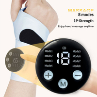 Mini appareil de massage pour les mains et les poignets, disponible en OEM, sans fil, EMS, enveloppement de poignet pulsé, pour cadeaux d'affaires et confort en voyage