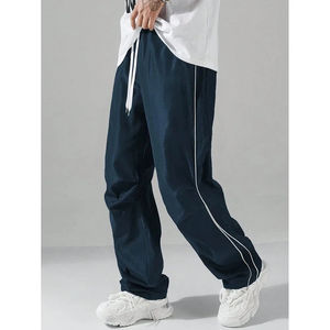 Pantalones acampanados personalizados con servicio OEM, precio al por mayor, pantalones de chándal de pierna recta, pantalones acampanados holgados de nailon en blanco de poliéster para hombre - Product Image 2