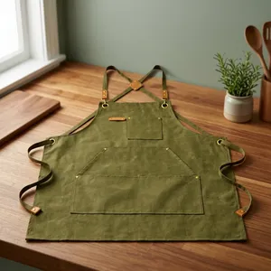 Delantal Clásico Verde de Lona Resistente sin Mangas con Múltiples Bolsillos, Reutilizable, Ecológico y Moderno para Cocinar y Uso Diario - Product Image 1