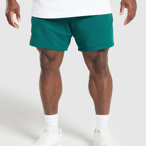 Pantalones cortos de poliéster de alta calidad con logotipo personalizado OEM al por mayor, pantalones cortos deportivos de malla con bolsillo por sublimación para hombre, novedad - Product Image 1