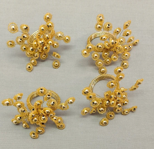 Ensemble de 4 ronds de serviette en perles dorées - Product Image 1