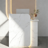 Bureau d'accueil moderne de luxe couleur personnalisée, surface solide, décoration lumineuse LED, garantie 10 ans pour hôtel, salon, clinique dentaire