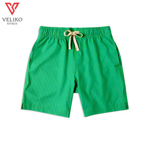 Short de surf en toile de qualité supérieure pour hommes, tissu extensible en spandex anti-rides, taille moyenne, vêtements de plage écologiques pour le surf, coupe décontractée - Product Image 1