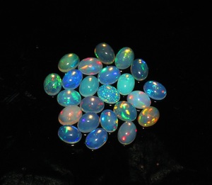 23-Piece Lot of Natural Ethiopian Opal 5x7mm Oval Shape Loose Gemstone Cabochons 23 Pieces Lot - Product Image 3