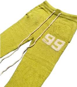 Pantalones de chándal acampanados informales de algodón 100% personalizados OEM al por mayor-Pantalones tejidos borrosos de invierno ecológicos para hombre con logotipo personalizado - Product Image 3