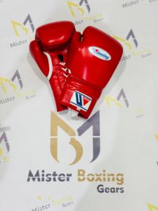 ชุดอุปกรณ์มวยระดับมืออาชีพ สีแดง ประกอบด้วยหมวกนิรภัย ถุงมือ และอุปกรณ์ป้องกันขาหนีบ สำหรับฝึกซ้อมและแข่งขัน - Product Image 3