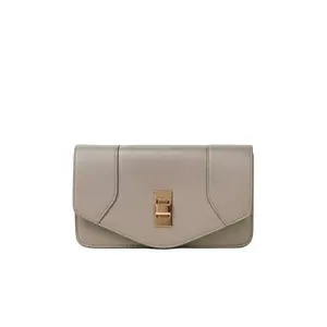 Women's luxury crossbody mini bag handcrafted in beige calfskin entirely designed and made in Italy