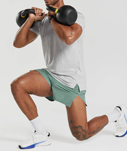 Shorts de sport pour hommes en toile de couleur unie, écologiques, à séchage rapide, respirants, imperméables, avec taille élastique, pour la gym, le fitness et le jogging - Product Image 4