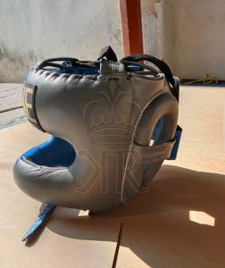 หมวกกันน็อคปกป้องศีรษะทำจากหนัง PU อุปกรณ์ฝึกมวยสำหรับศิลปะการต่อสู้ป้องกันใบหน้าออกแบบโลโก้ได้ตามต้องการ - Product Image 1