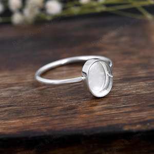 แหวนเงินแท้ 925 ชุบทอง 18k ทรงวงรี 7x9 มม. สำหรับใส่พลอยคาโบชอง  งานแฮนด์เมด  สำหรับใส่เรซิ่นน้ำนมแม่ หรือใส่เถ้ากระดูก  ทำเป็นเครื่องประดับเก็บความทรงจำ DIY - Product Image 4