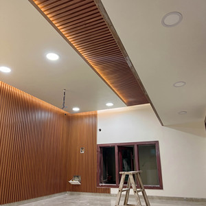 Panel de Pared Ranurado WPC Impermeable y Resistente al Fuego B1 de 2900 mm, Revestimiento Decorativo Interior de PVC con Aspecto de Madera para Proyectos de Hoteles y Villas - Product Image 4