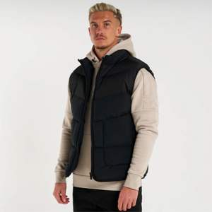 Man Jacket Mid Grey Gilet Modern Layering Piece with <b>Funnel</b> Neck, Functional Side Pockets and Versatile Styling for All Seasons - Product Image 2