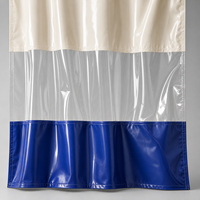 Rideau de soudure en PVC avec fenêtre de visualisation transparente, jupe inférieure bleue et système de rail coulissant pour cloisonnement d'atelier industriel