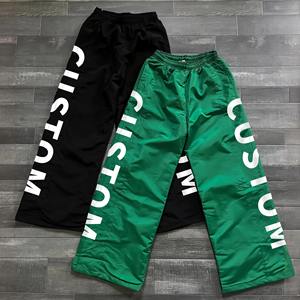 กางเกงวิ่งออกกำลังกายแนวสตรีทสำหรับผู้ชายและผู้หญิงพิมพ์ลายได้ตามต้องการกางเกงสเวตเตอร์ทรงแบ็กกี้ระบายอากาศได้ดีมีดีไซน์ตัวอักษรเย็บปะติด - Product Image 1