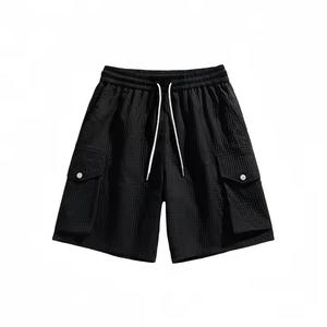 Pantalones cortos deportivos activos para hombre de poliéster de verano a precio barato de fábrica, pantalones deportivos informales con logotipo personalizado de Color sólido, teñidos lisos - Product Image 2