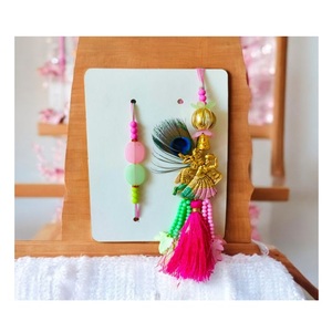 Meilleure vente de gros paniers cadeaux décoratifs tendance pour enfants Rakhi designs personnalisés pierres Kundan fil de soie pour l'exportation - Product Image 2