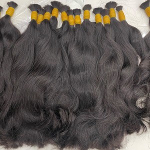 Vente en gros de cheveux humains vierges vietnamiens alignés avec de longues cuticules style noir ondulé naturel en vrac - Product Image 2