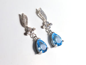 ต่างหูพลอยบลูโทแพซแท้จากสวิสเซอร์แลนด์ รูปทรงลูกแพร์ ขนาด 10x7 มม. ขัดเงาอย่างดี ของขวัญสำหรับเธอ - Product Image 3